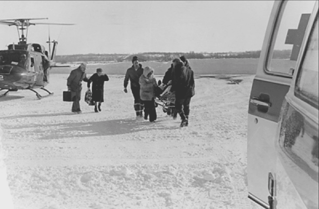 Blizzard of 1977 - Dexter Ambulance and Fort Drum Helicopter transporting emergency situation